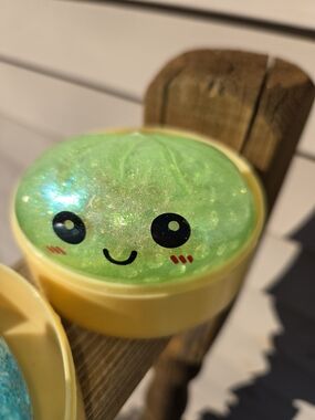Green Dumpling Squishy Toy - Smiley Face